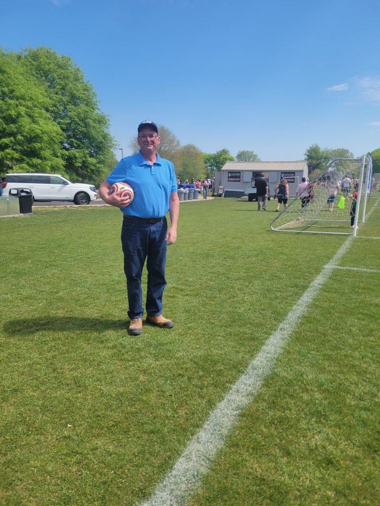 Greg standing on a Farragut community sports field